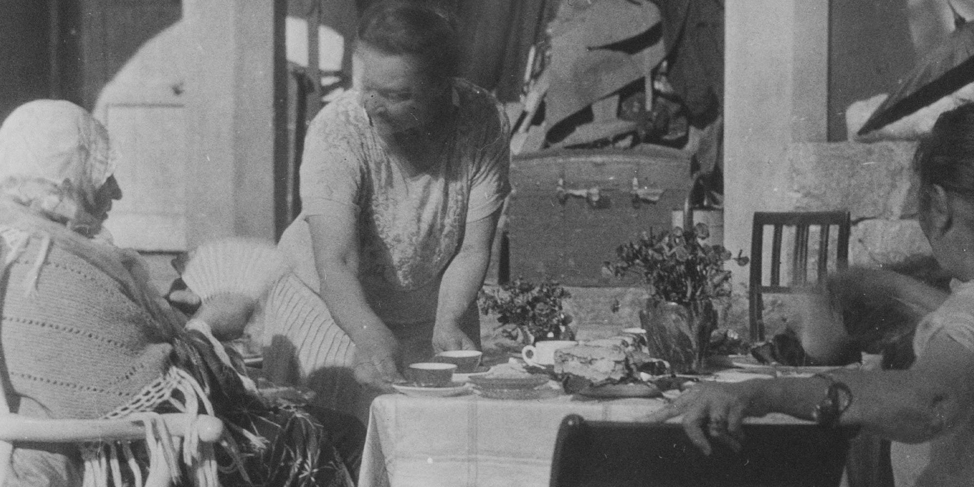Coffee beans being roasted in traditional roaster